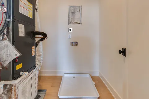a view of entryway with wooden floor