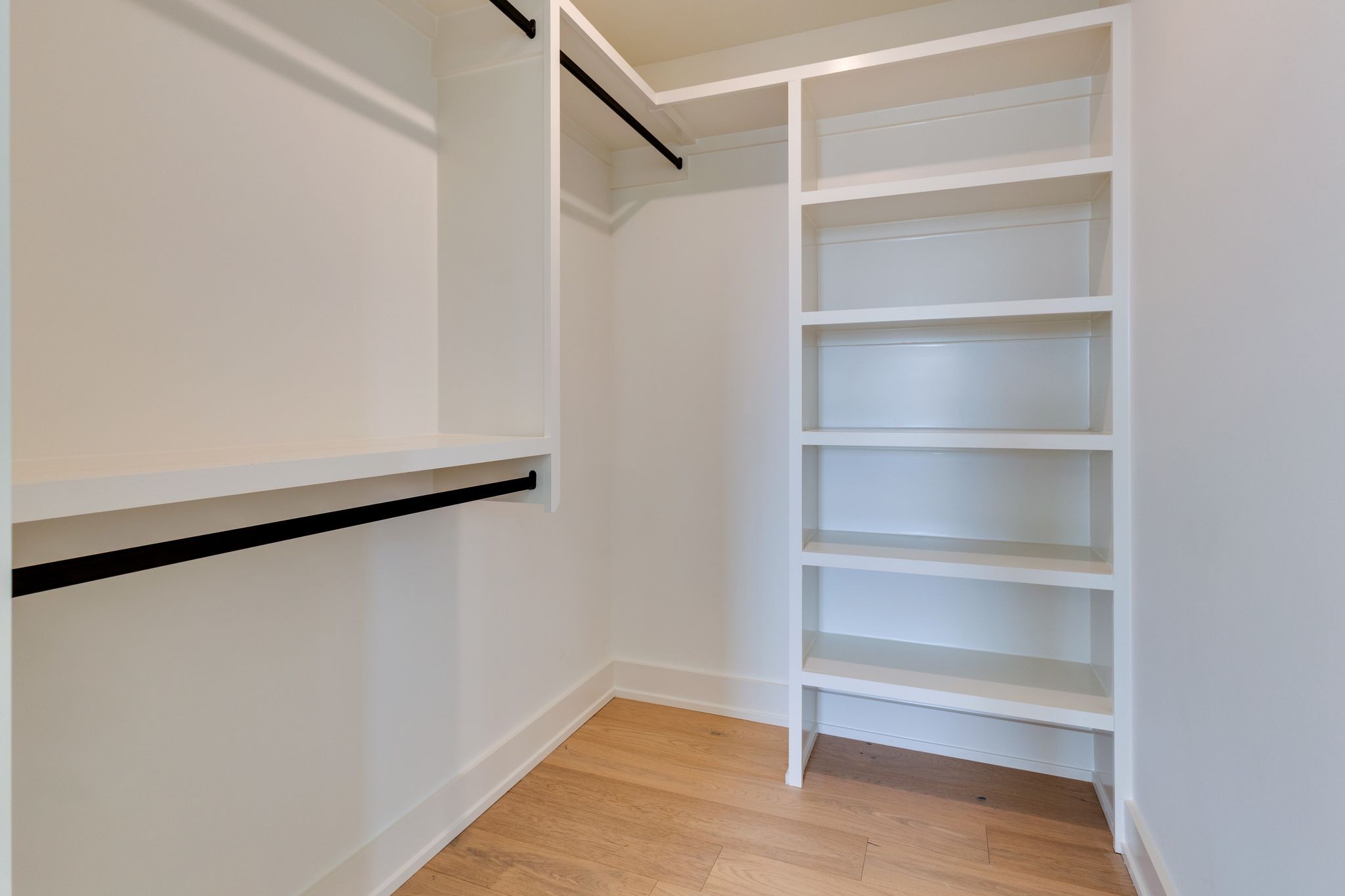 531 Midnight Way Nashville, TN 37209 - Photo 20 of 44 a view of walk in closet with empty racks