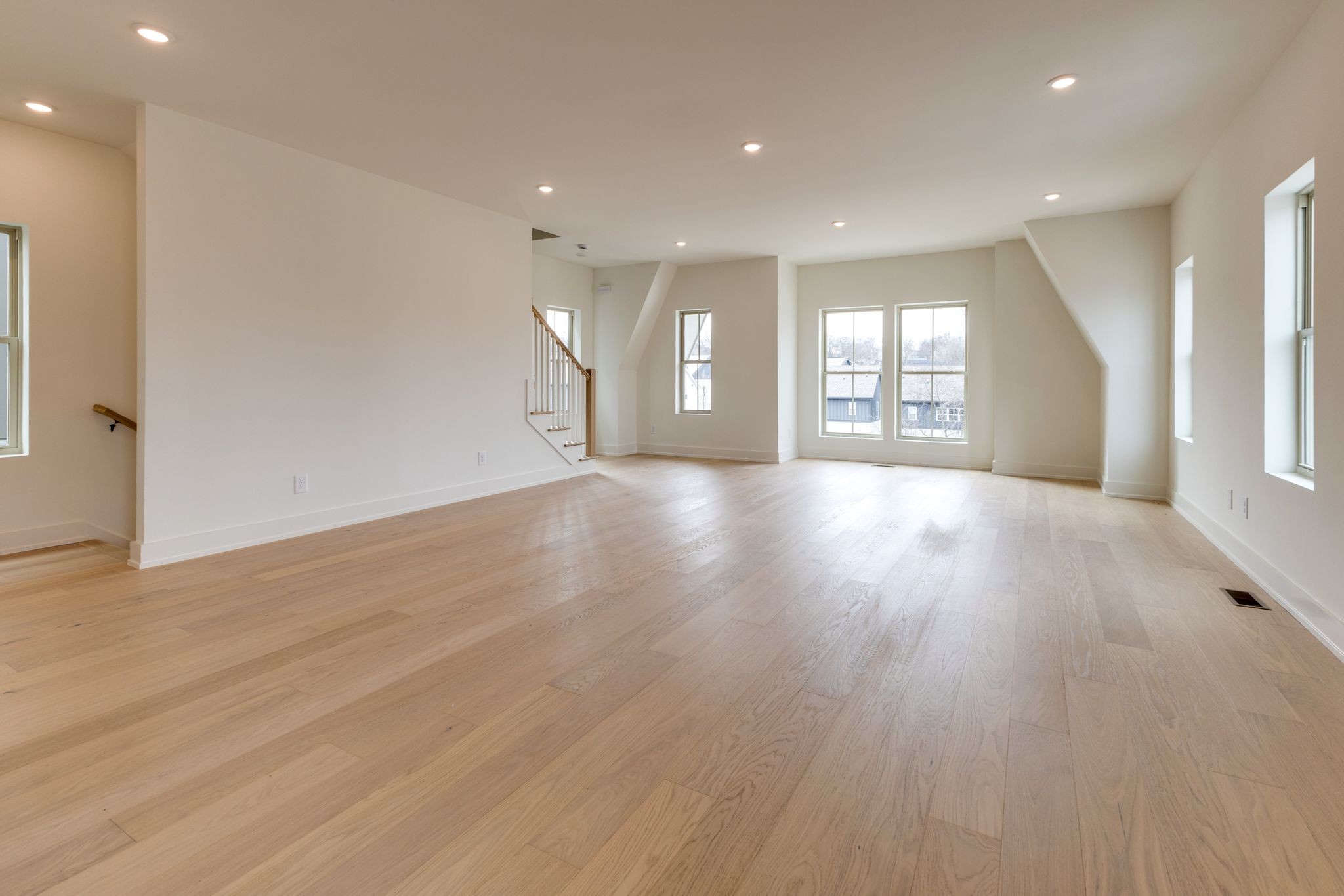 531 Midnight Way Nashville, TN 37209 - Photo 8 of 44 a view of an empty room with wooden floor and a window