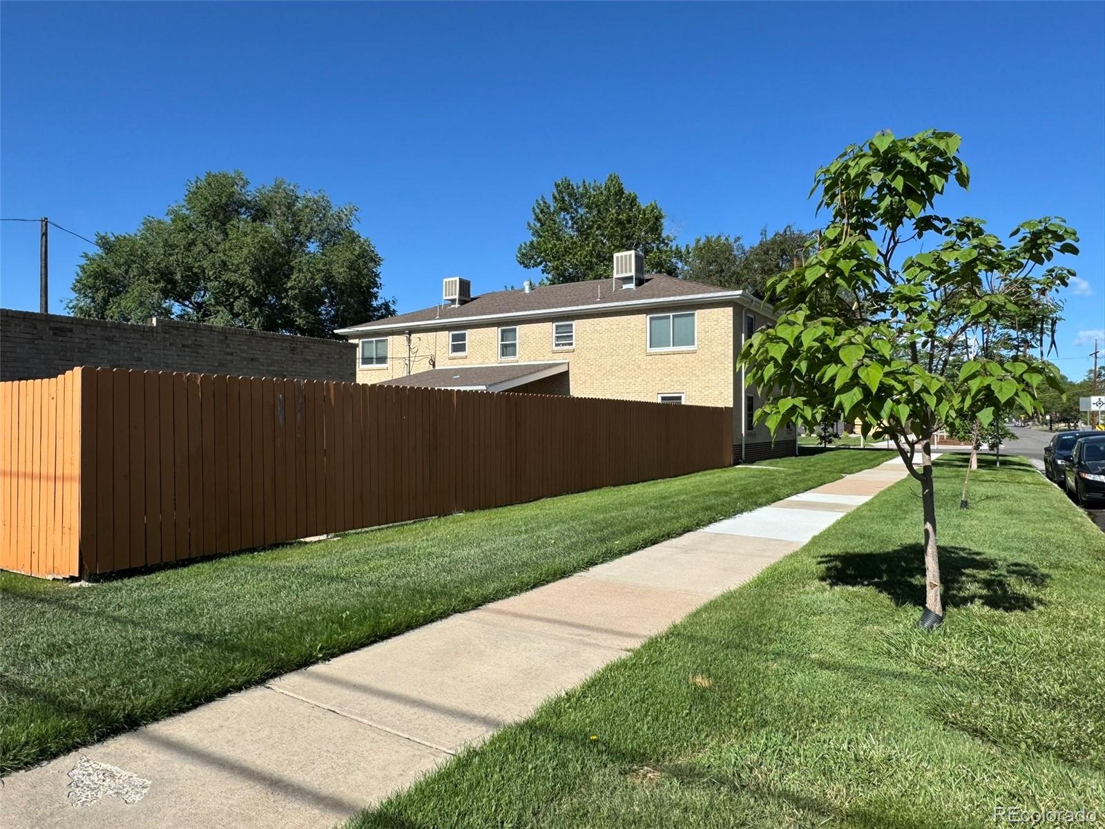 2050 Perry Street Denver, CO 80212 - Photo 11 of 15 a backyard of a house with lots of green space