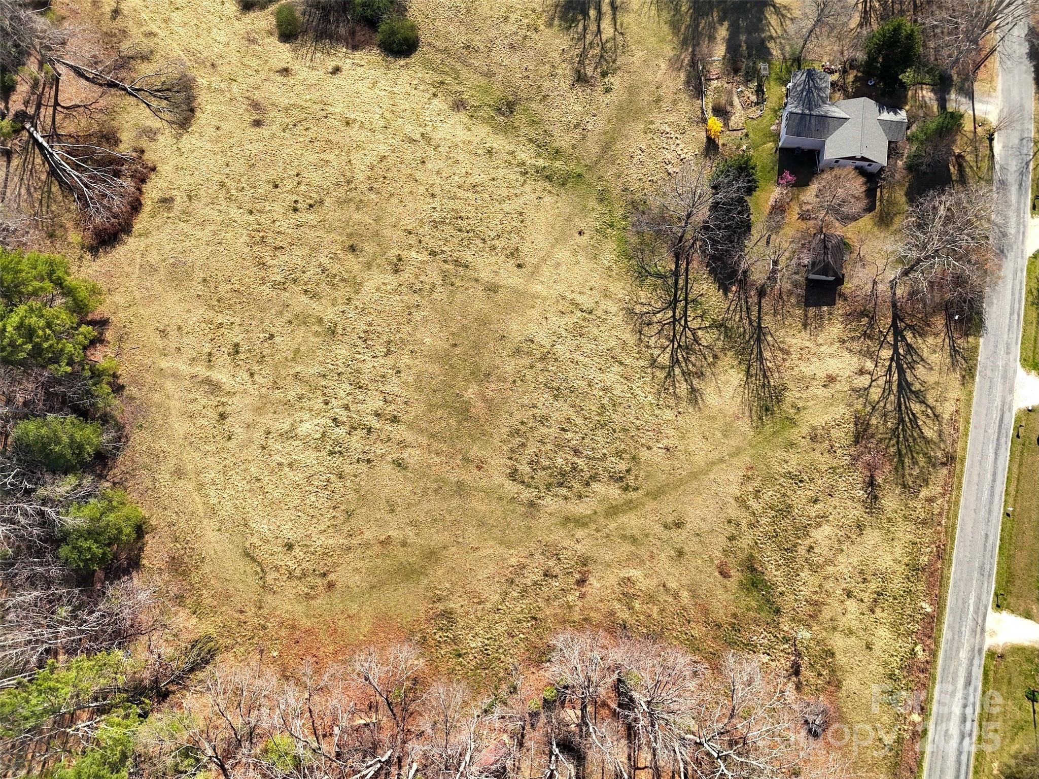 Tbd Lytle Road Fletcher, NC 28732 - Photo 15 of 39 a bathroom with a shower curtain