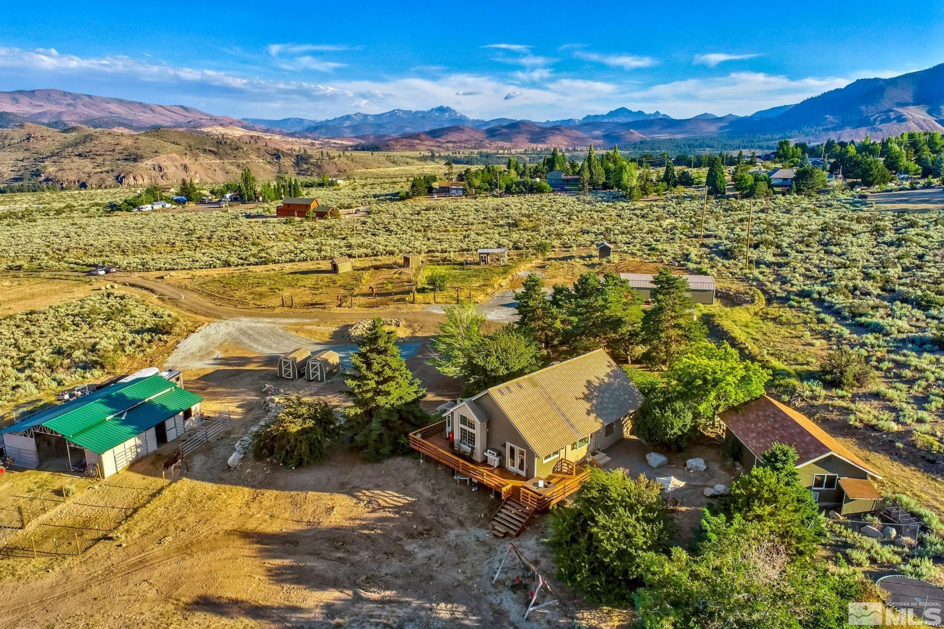 1980 Emigrant Trail Woodfords, CA 96120 - Photo 1 of 40 an aerial view of residential houses with outdoor space and trees