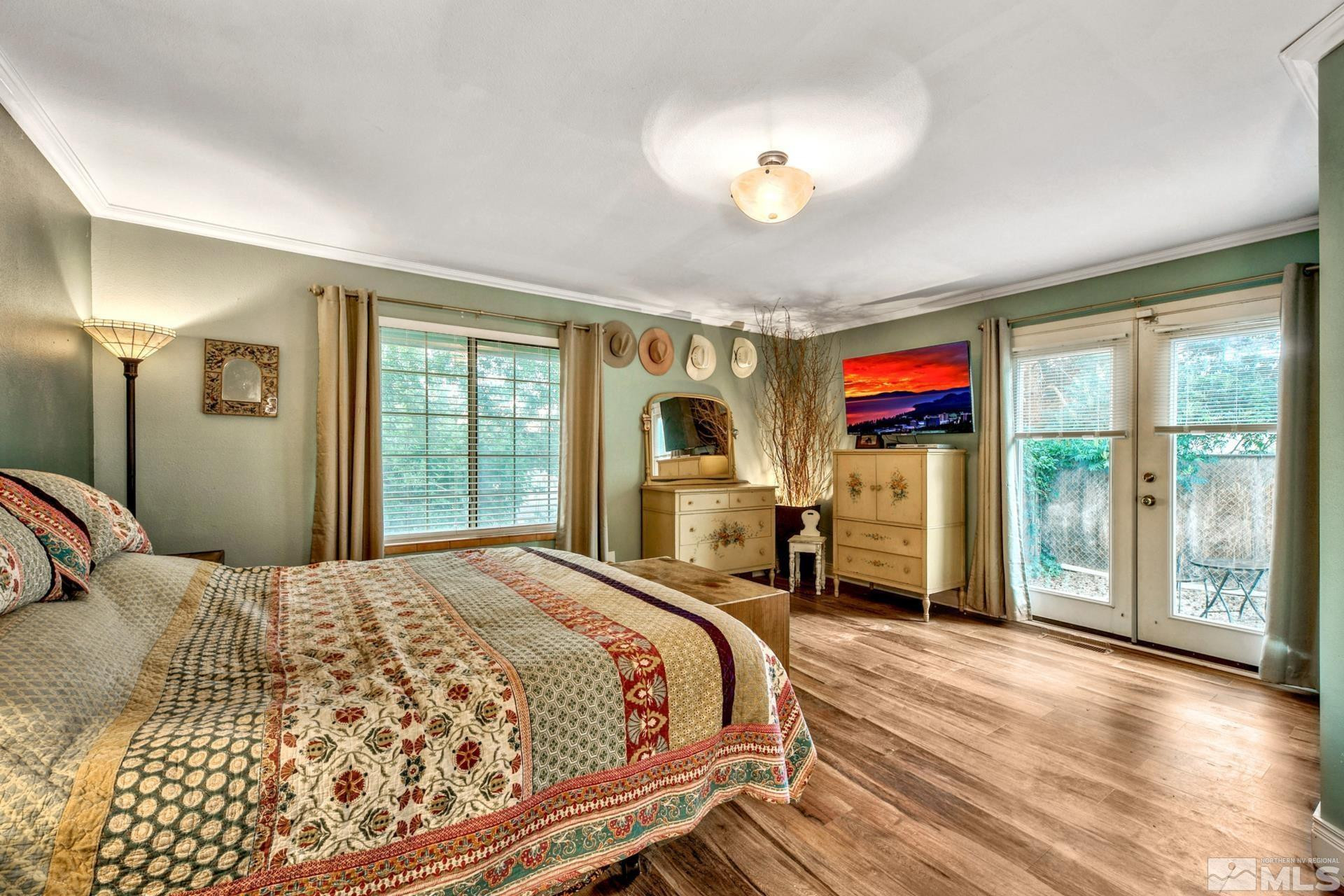 1980 Emigrant Trail Woodfords, CA 96120 - Photo 25 of 40 a bedroom with a bed and a large window