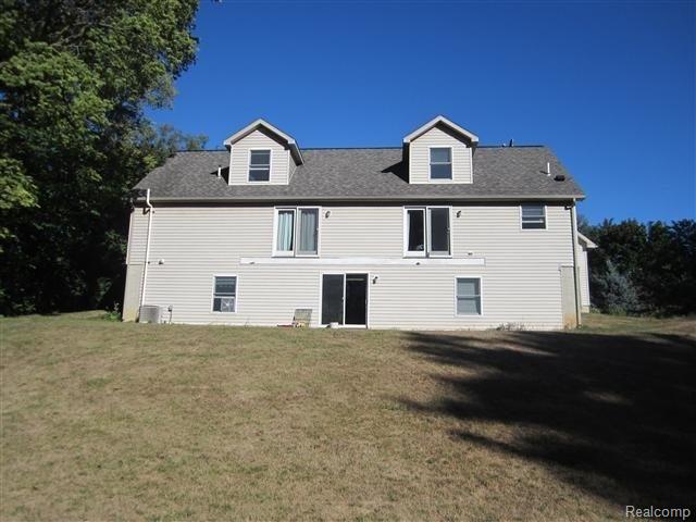 433 Riley Street Dundee, MI 48131 - Photo 4 of 24 4-Rear Exterior.JPG