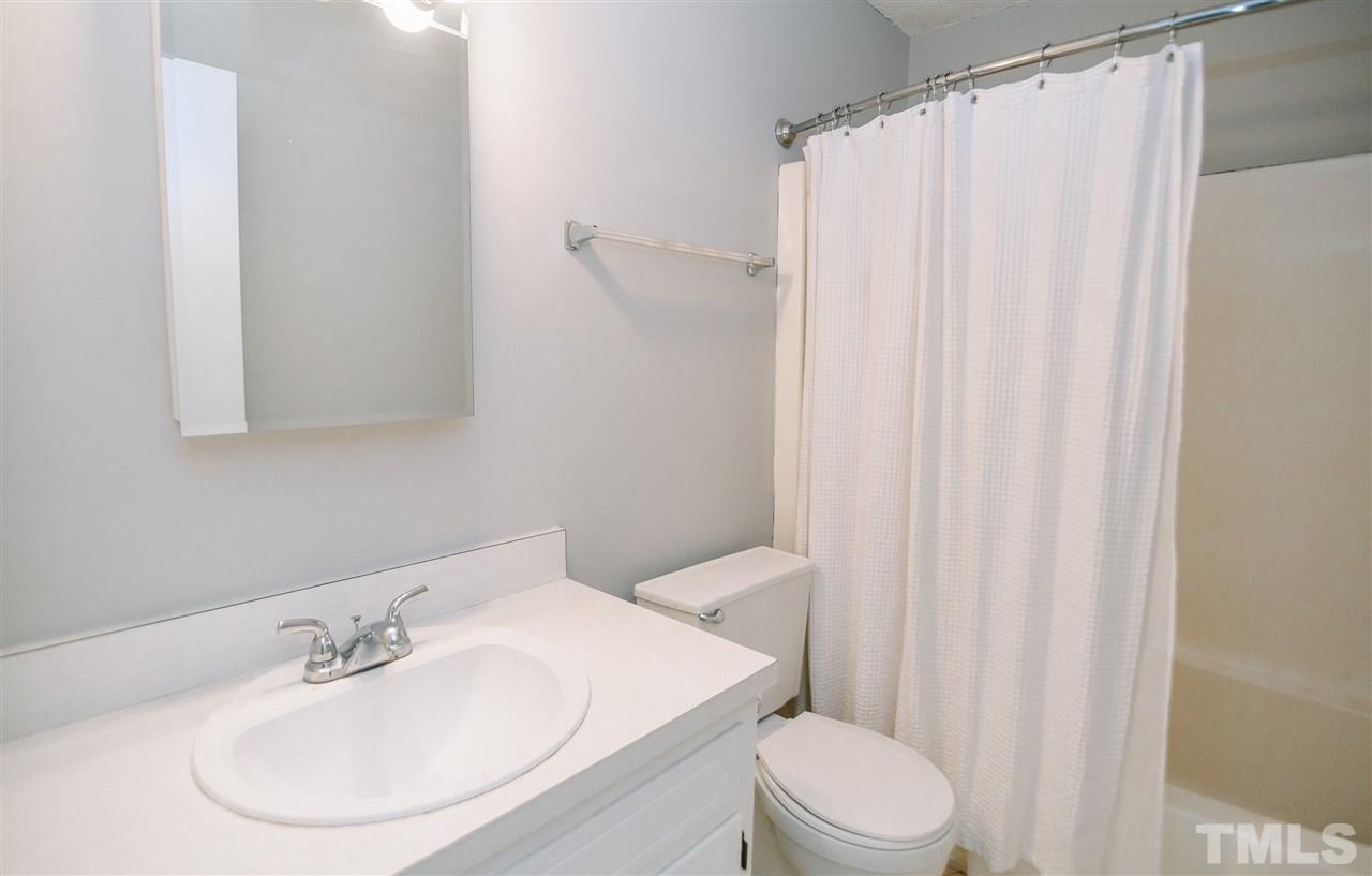 3904 Wendy Lane Raleigh, NC 27606 - Photo 13 of 18 Bathroom features vanity and tub/shower combo!