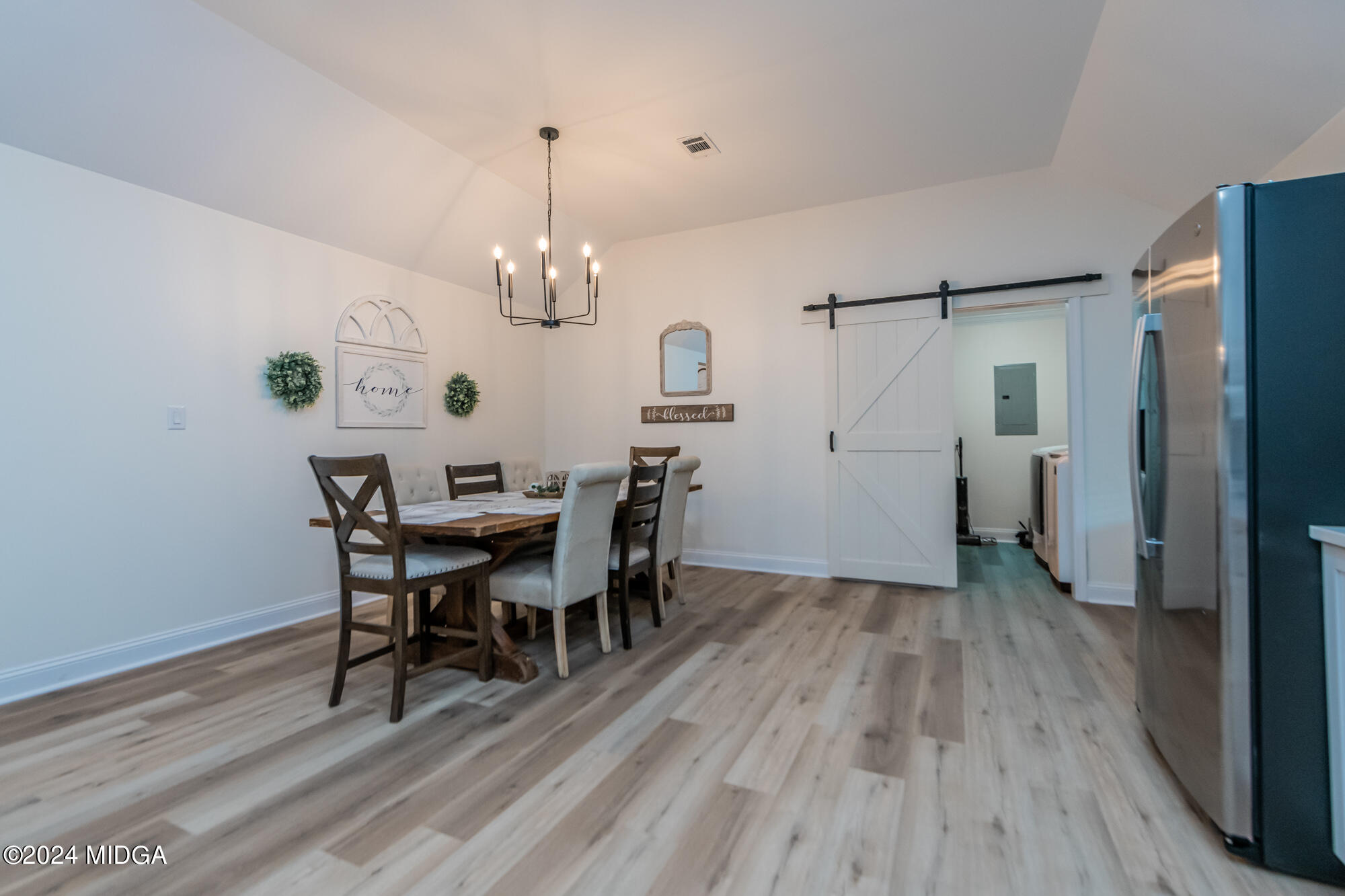 2454 Union Church Road Fort Valley, GA 31030 - Photo 20 of 50 a view of a dining room with furniture and wooden floor