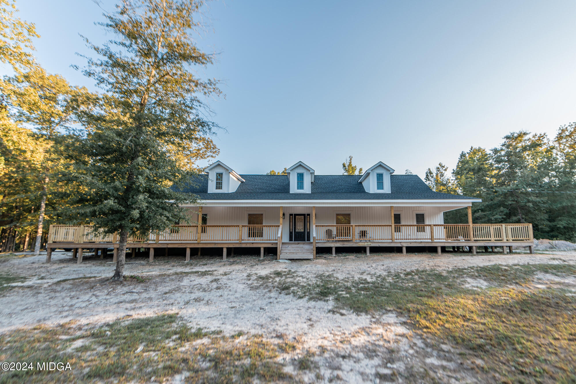 2454 Union Church Road Fort Valley, GA 31030 - Photo 2 of 50 a view of a house with a yard and sitting area