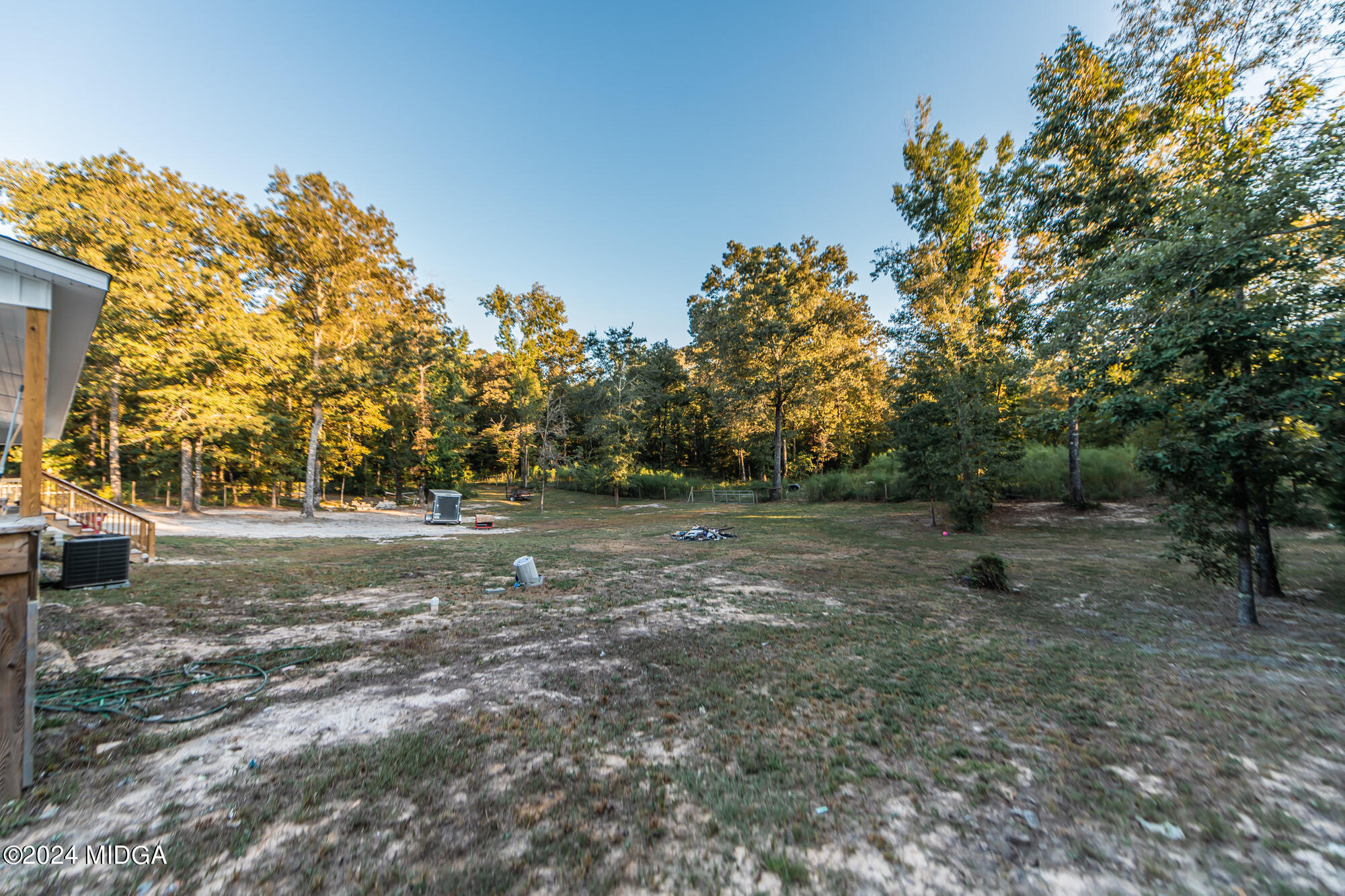 2454 Union Church Road Fort Valley, GA 31030 - Photo 5 of 50 a view of a tree in the middle of a yard