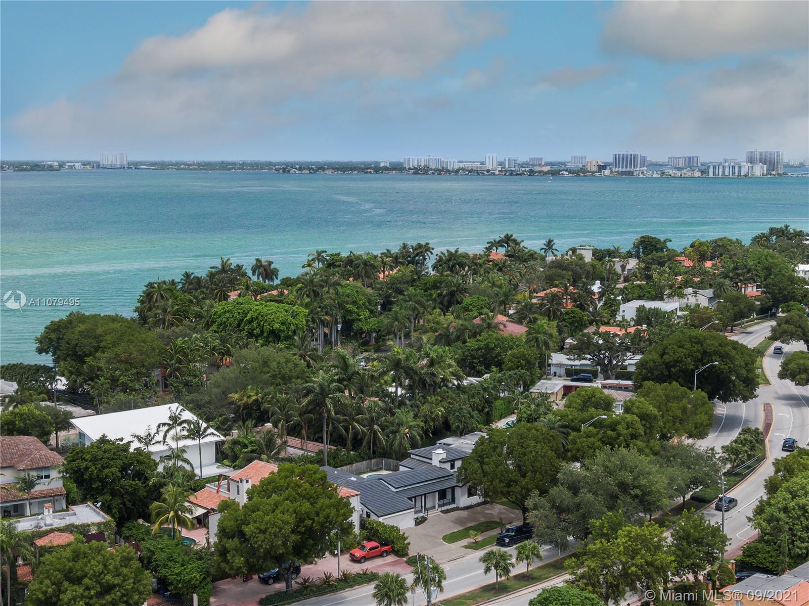 4450 Alton Road Miami Beach, FL 33140 - Photo 1 of 35 a view of a lake and mountain