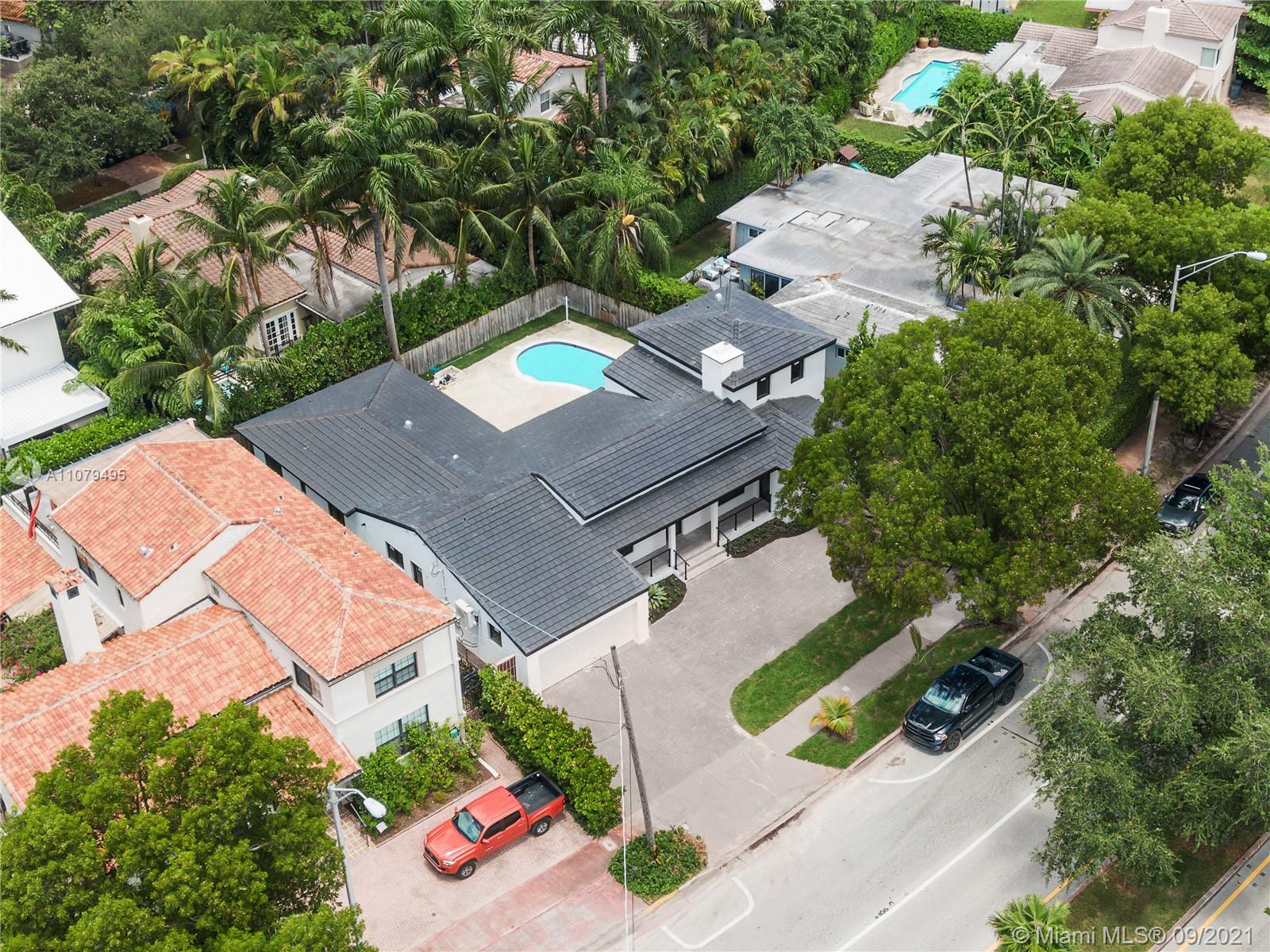 4450 Alton Road Miami Beach, FL 33140 - Photo 2 of 35 an aerial view of a house with garden space and street view