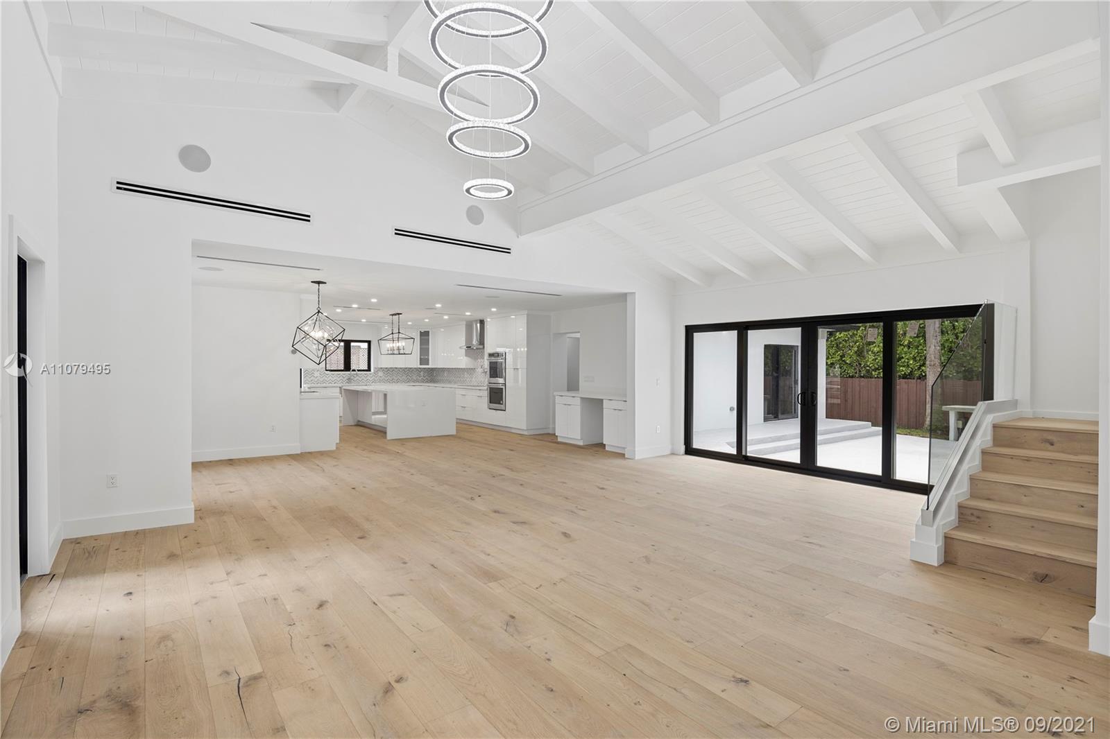 4450 Alton Road Miami Beach, FL 33140 - Photo 4 of 35 a view of an empty room with a window