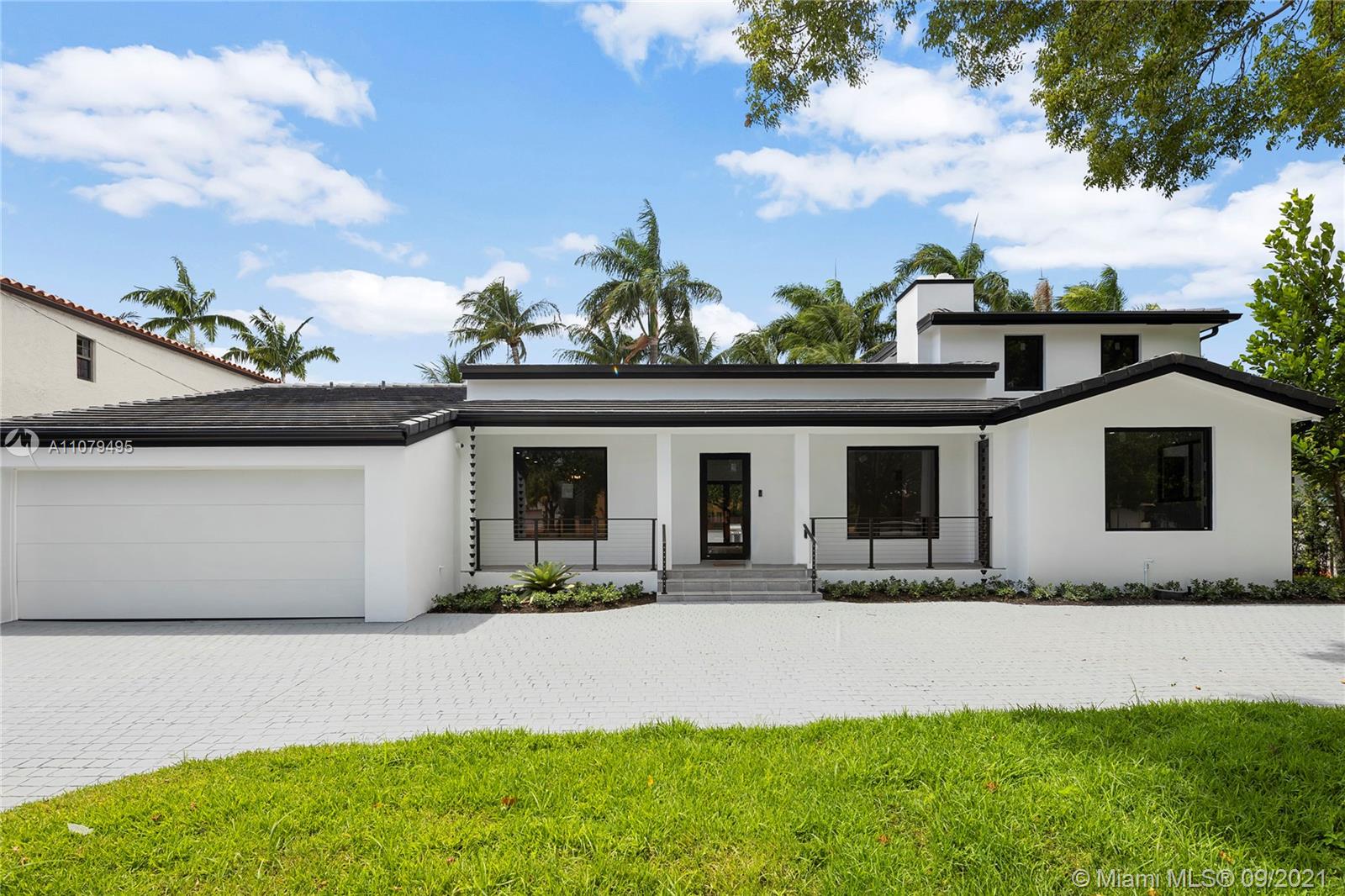 4450 Alton Road Miami Beach, FL 33140 - Photo 35 of 35 a front view of house with yard