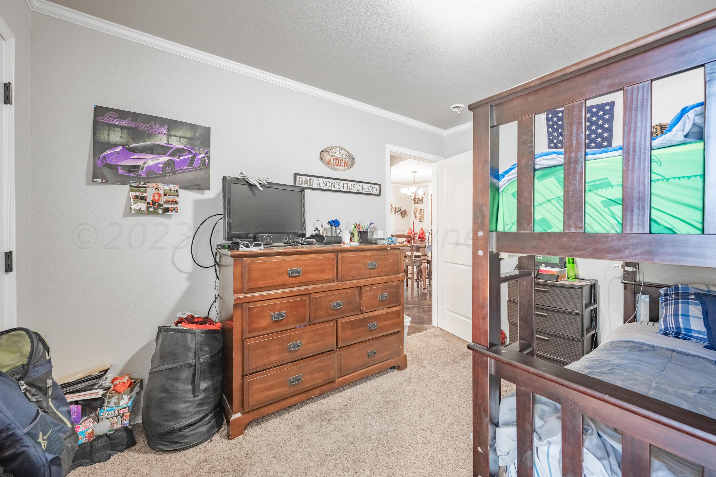 4502 Pine Street Amarillo, TX 79118 - Photo 14 of 20 a view of a workspace with furniture