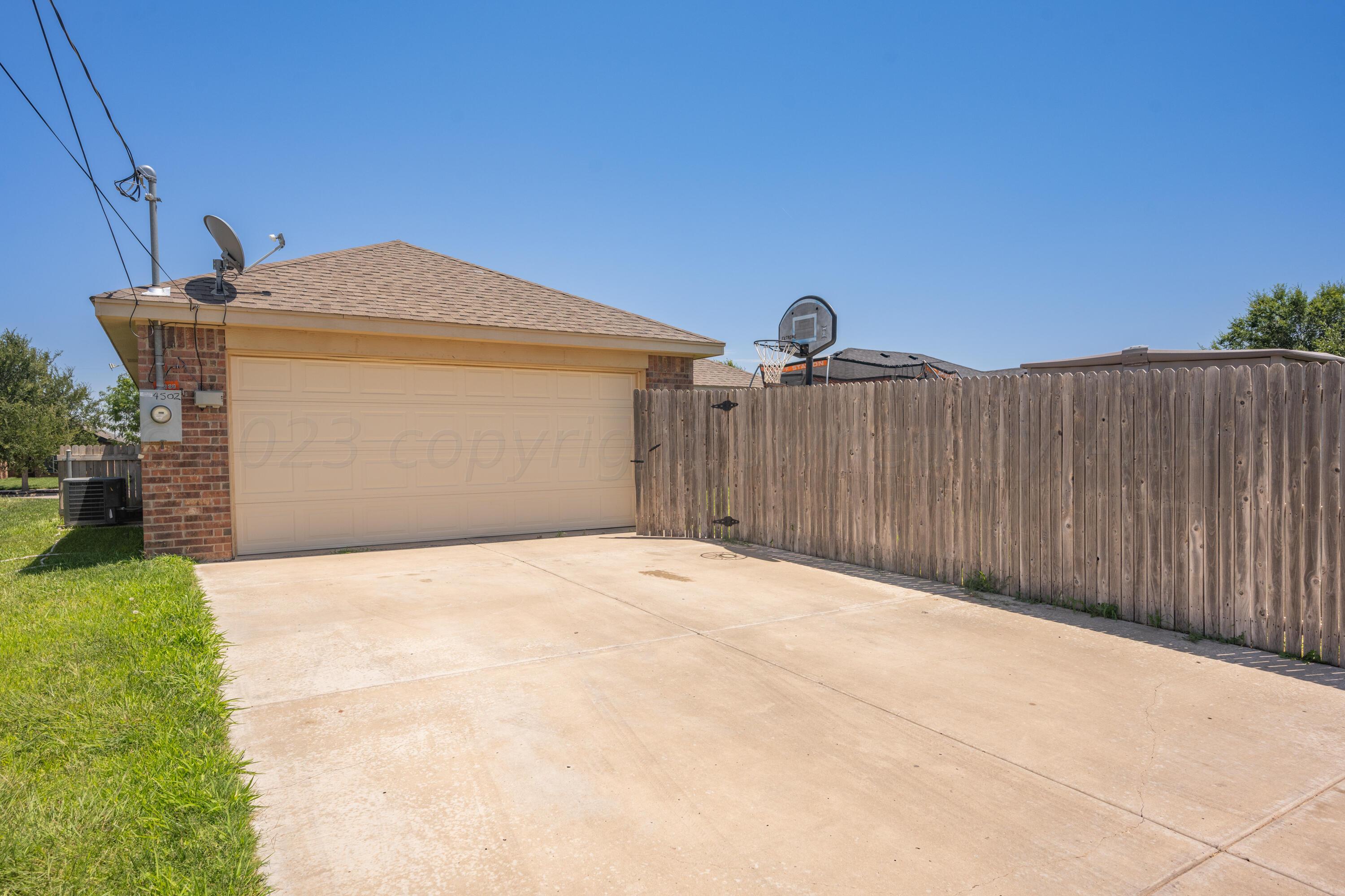 4502 Pine Street Amarillo, TX 79118 - Photo 19 of 20 a view of outdoor space and yard
