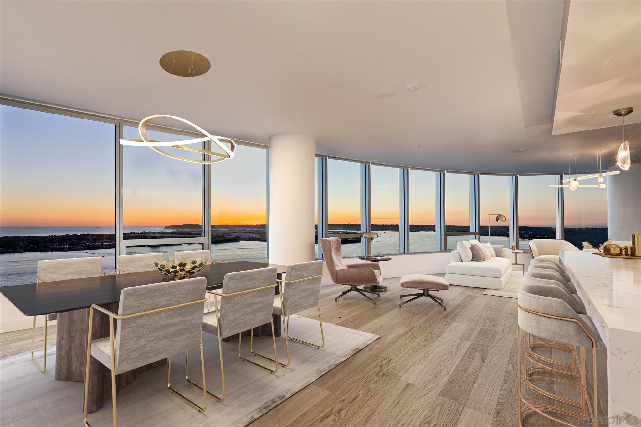 a very nice looking living room with furniture and floor to ceiling window