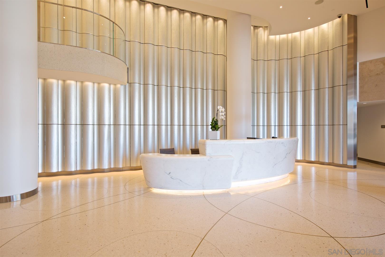 888 E Street, Unit 3502 San Diego, CA 92101 - Photo 18 of 35 a white bath tub sitting in a bathroom next to a window