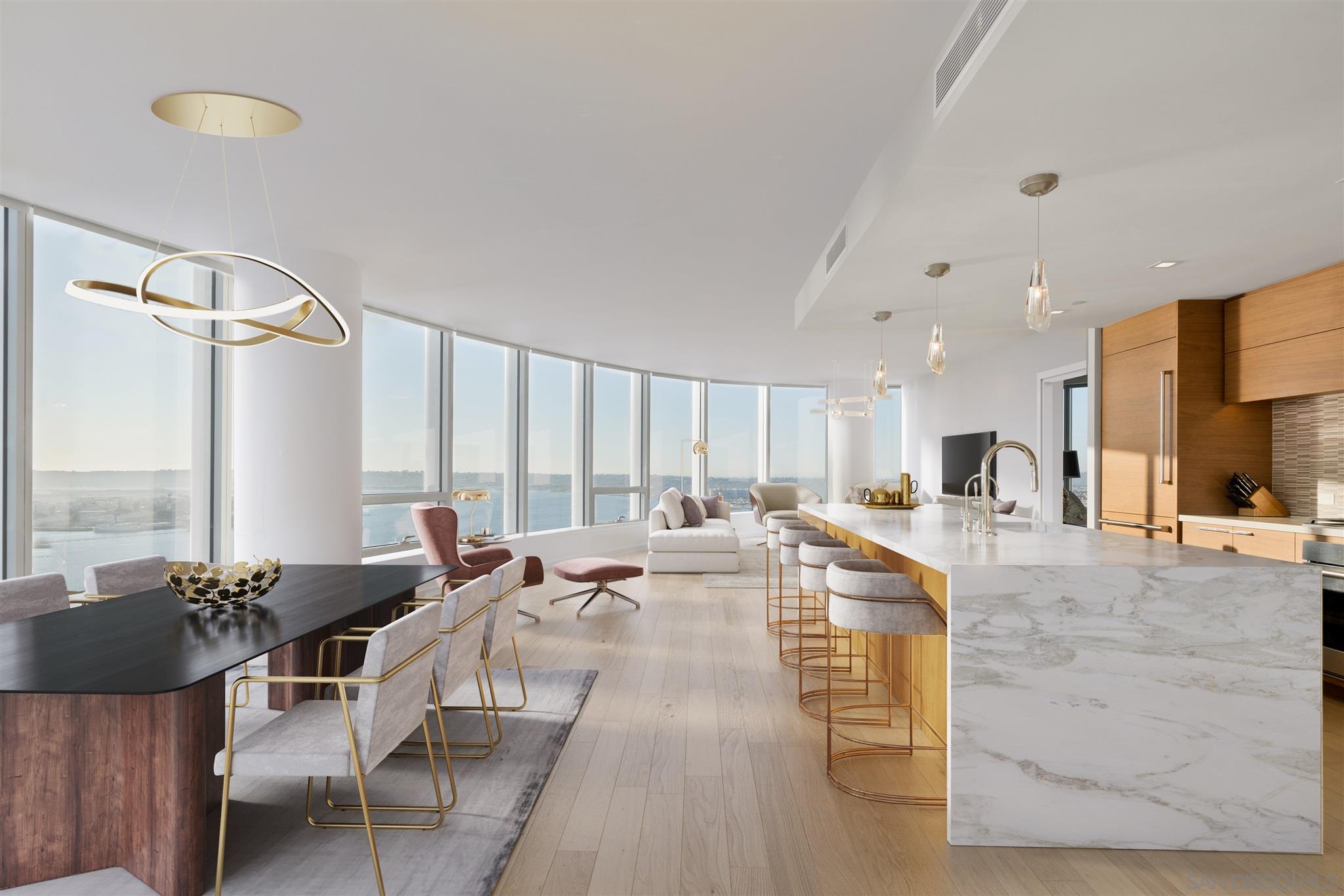 888 E Street, Unit 3502 San Diego, CA 92101 - Photo 2 of 35 a large kitchen with kitchen island a large window in it