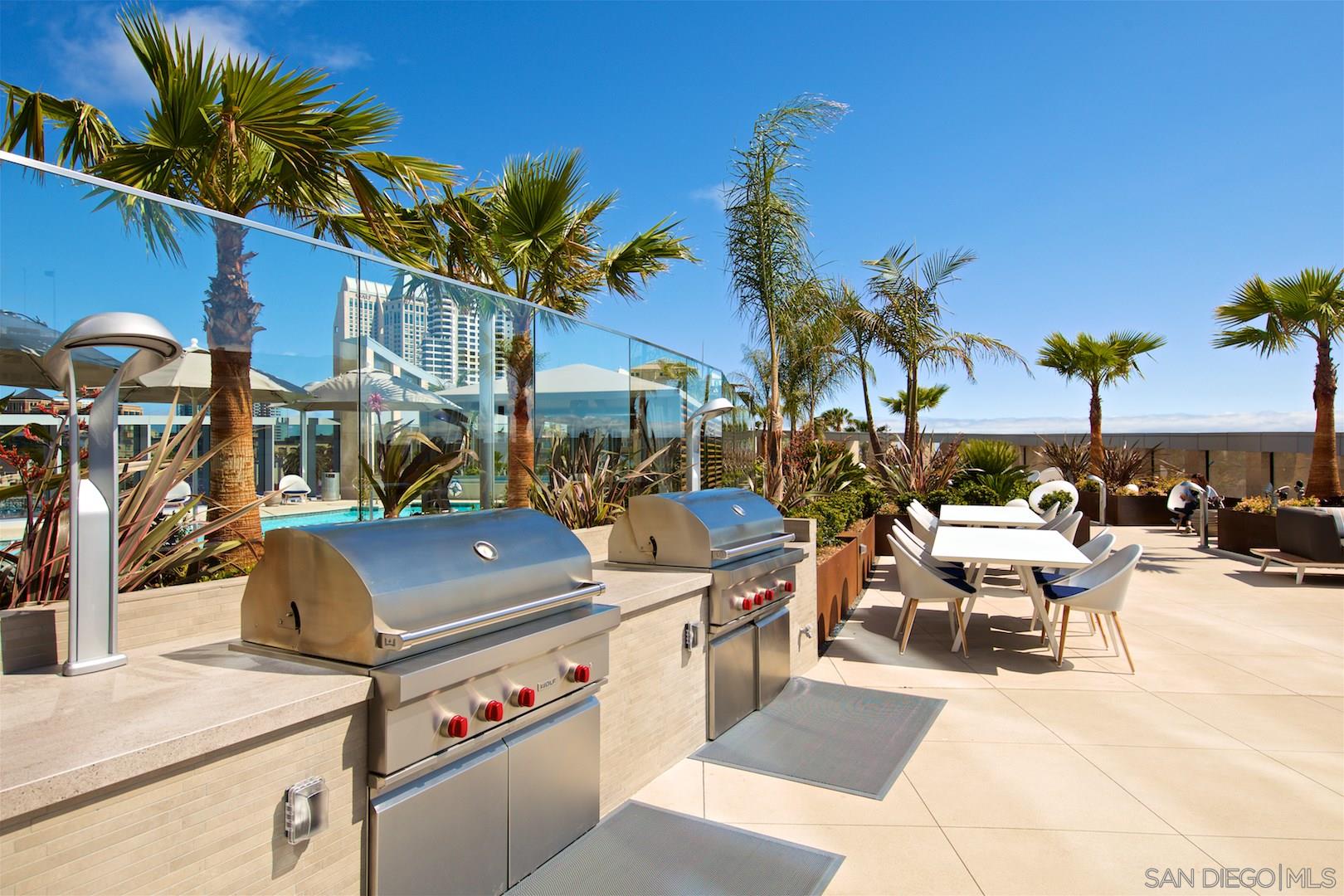888 E Street, Unit 3502 San Diego, CA 92101 - Photo 26 of 35 a view of a chairs and table in the patio