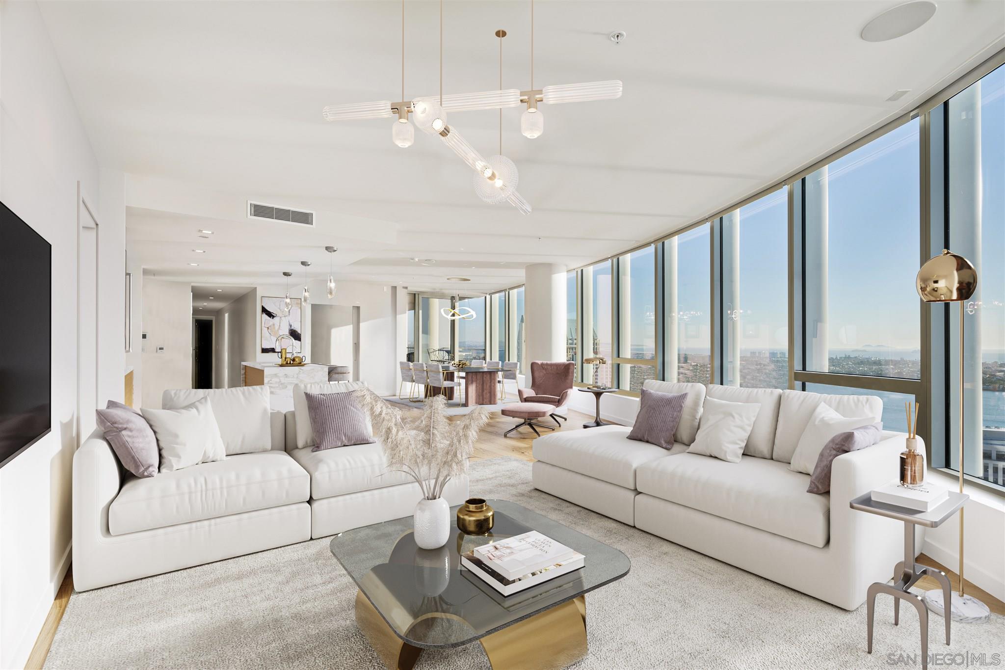 888 E Street, Unit 3502 San Diego, CA 92101 - Photo 5 of 35 a living room with furniture ceiling fan and a large window