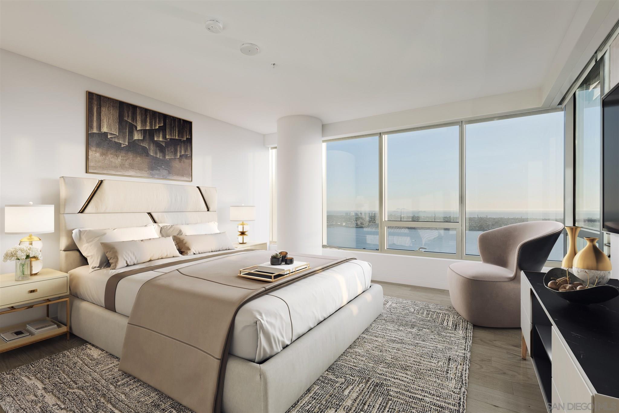 888 E Street, Unit 3502 San Diego, CA 92101 - Photo 6 of 35 a bed room with a bed and a couch