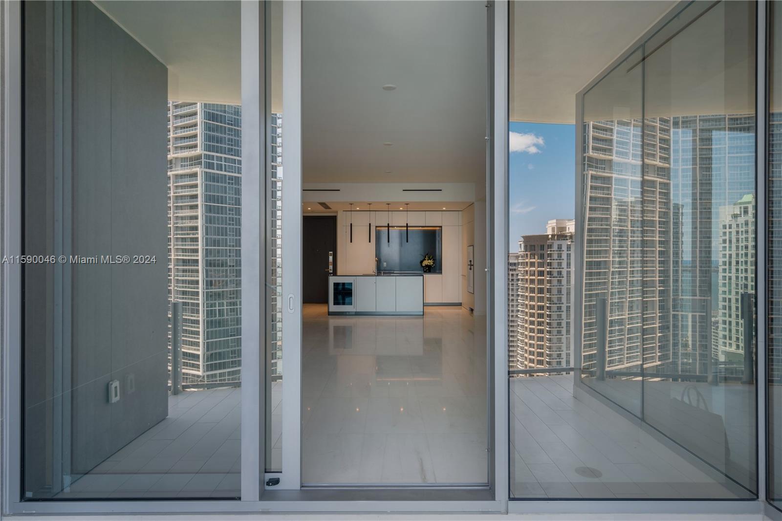 300 Biscayne Blvd Way, Unit 3105 Miami, FL 33131 - Photo 15 of 53 Love these reflections from the balcony! You can't see into the apartment with the doors closed