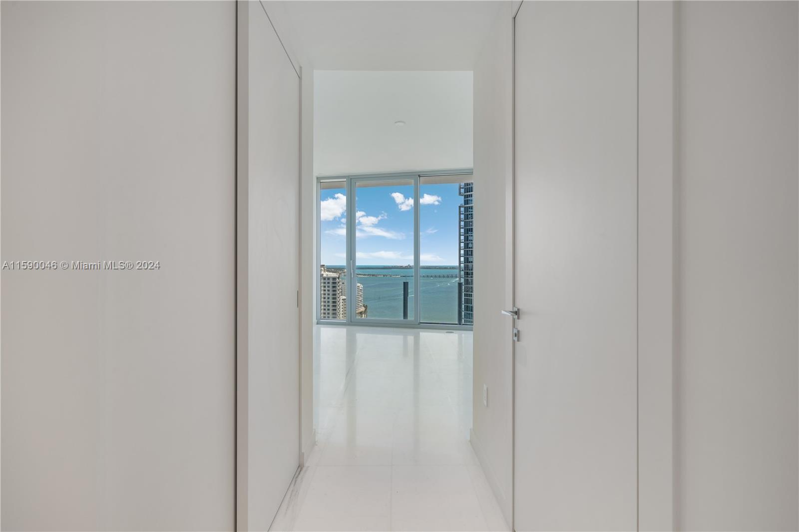 300 Biscayne Blvd Way, Unit 3105 Miami, FL 33131 - Photo 16 of 53 entrance to the primary bedroom with walk in closets!!