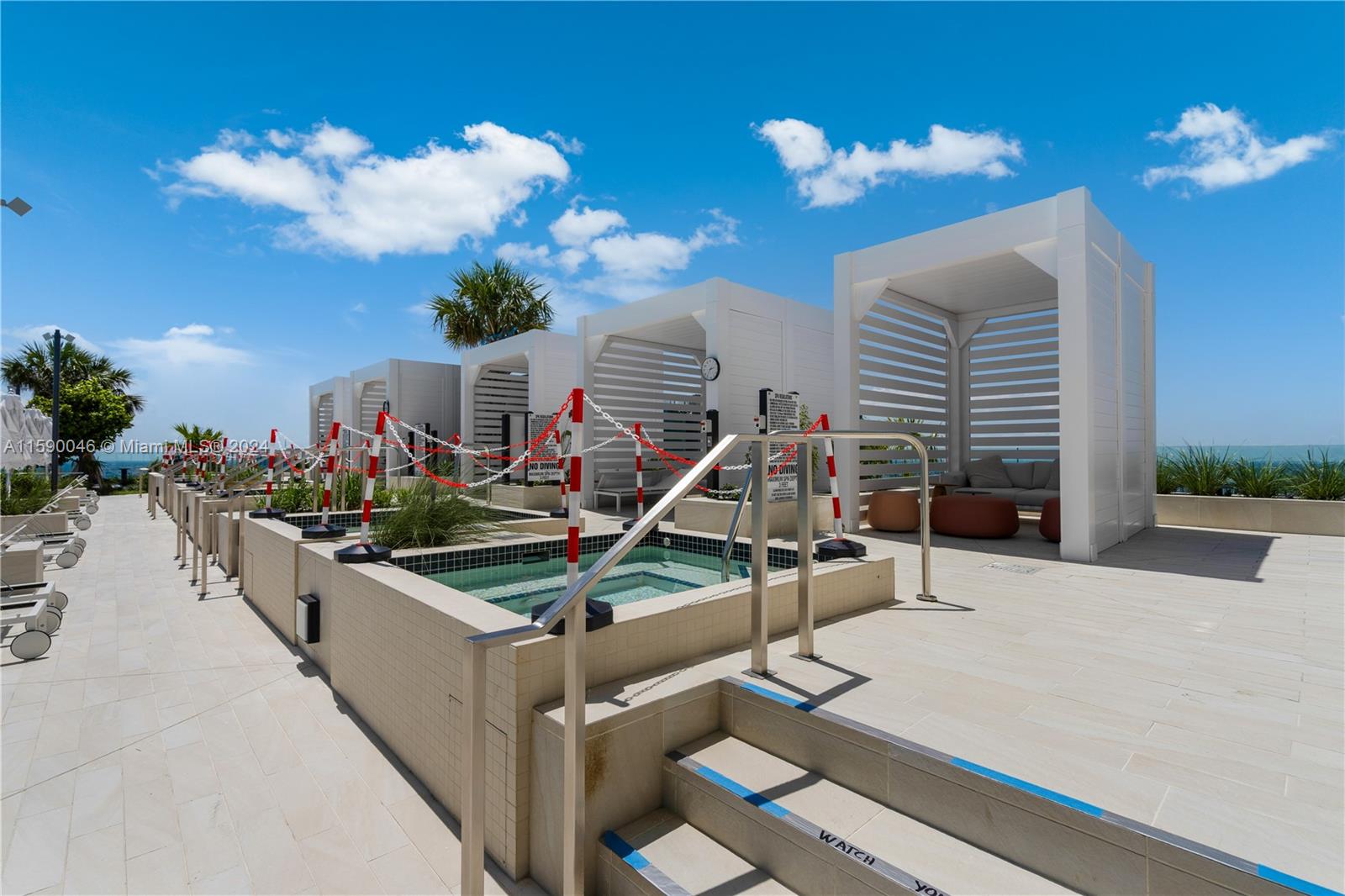300 Biscayne Blvd Way, Unit 3105 Miami, FL 33131 - Photo 36 of 53 Pool area with cabanas on the 55th floor