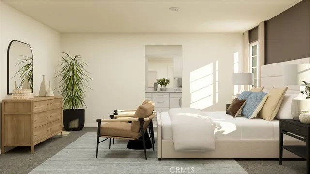 a bedroom with a bed and a couch