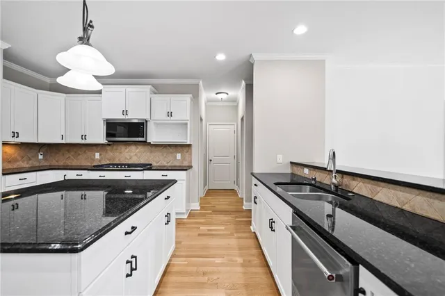 a white bath tub sitting in a bathroom