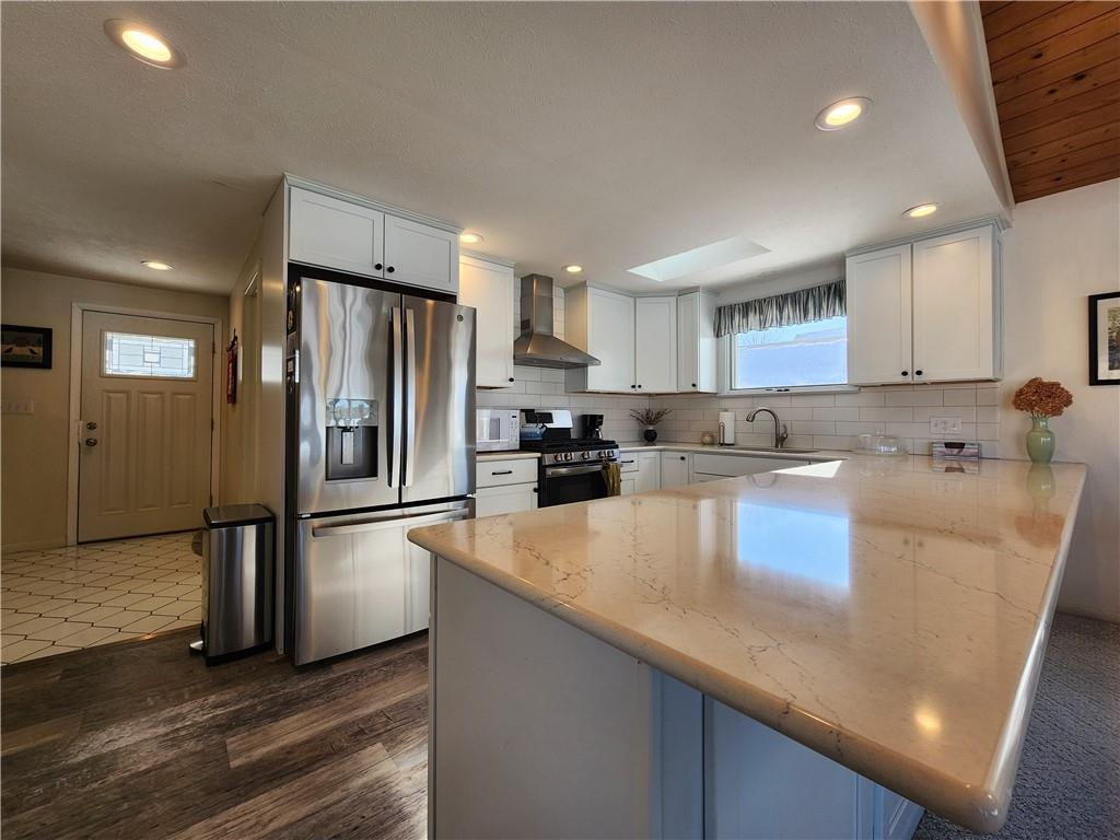 224 Latonka Drive Mercer, PA 16137 - Photo 17 of 42 a large kitchen with a large window and stainless steel appliances