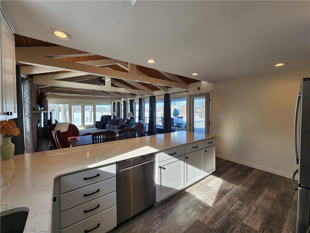 224 Latonka Drive Mercer, PA 16137 - Photo 18 of 42 a large room with stainless steel appliances kitchen island a chandelier