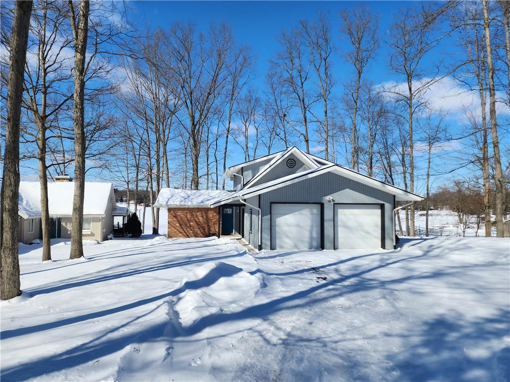224 Latonka Drive Mercer, PA 16137 - Photo 2 of 42 a house with trees in front of it
