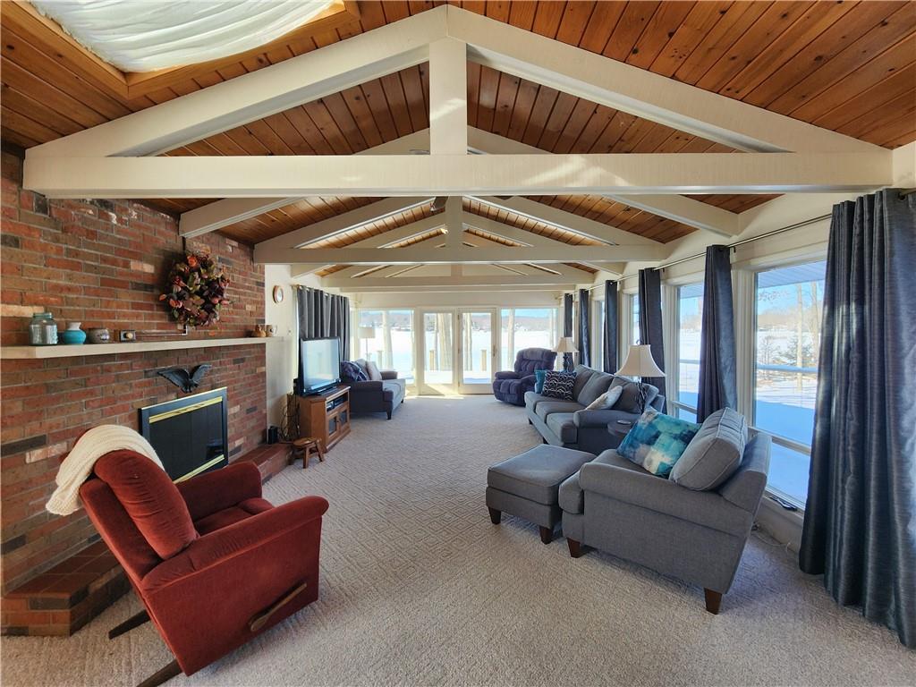 224 Latonka Drive Mercer, PA 16137 - Photo 26 of 42 a living room with furniture and a chandelier