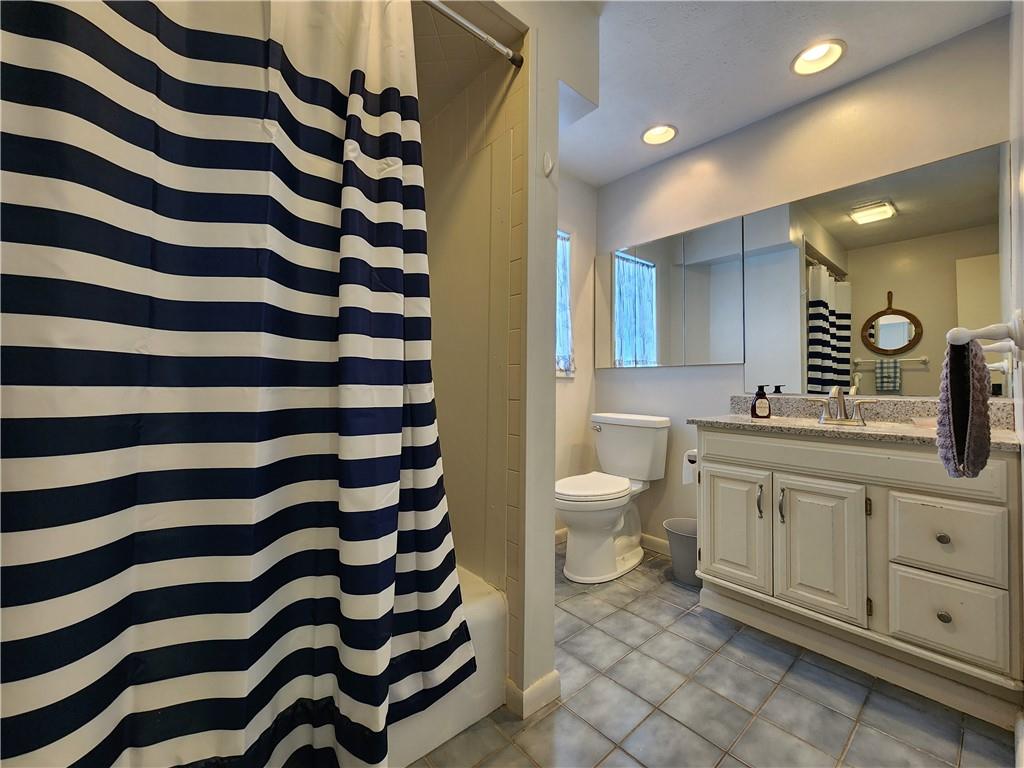 224 Latonka Drive Mercer, PA 16137 - Photo 33 of 42 a bathroom with a double vanity sink and a mirror