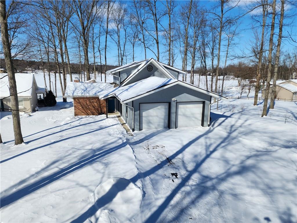 224 Latonka Drive Mercer, PA 16137 - Photo 4 of 42 a house with trees in front of it