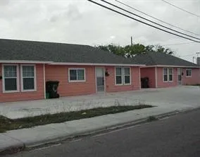 front view of a house with a street