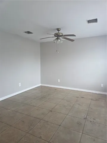 a view of a big room with carpet