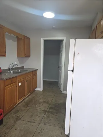 a view of a kitchen with a sink