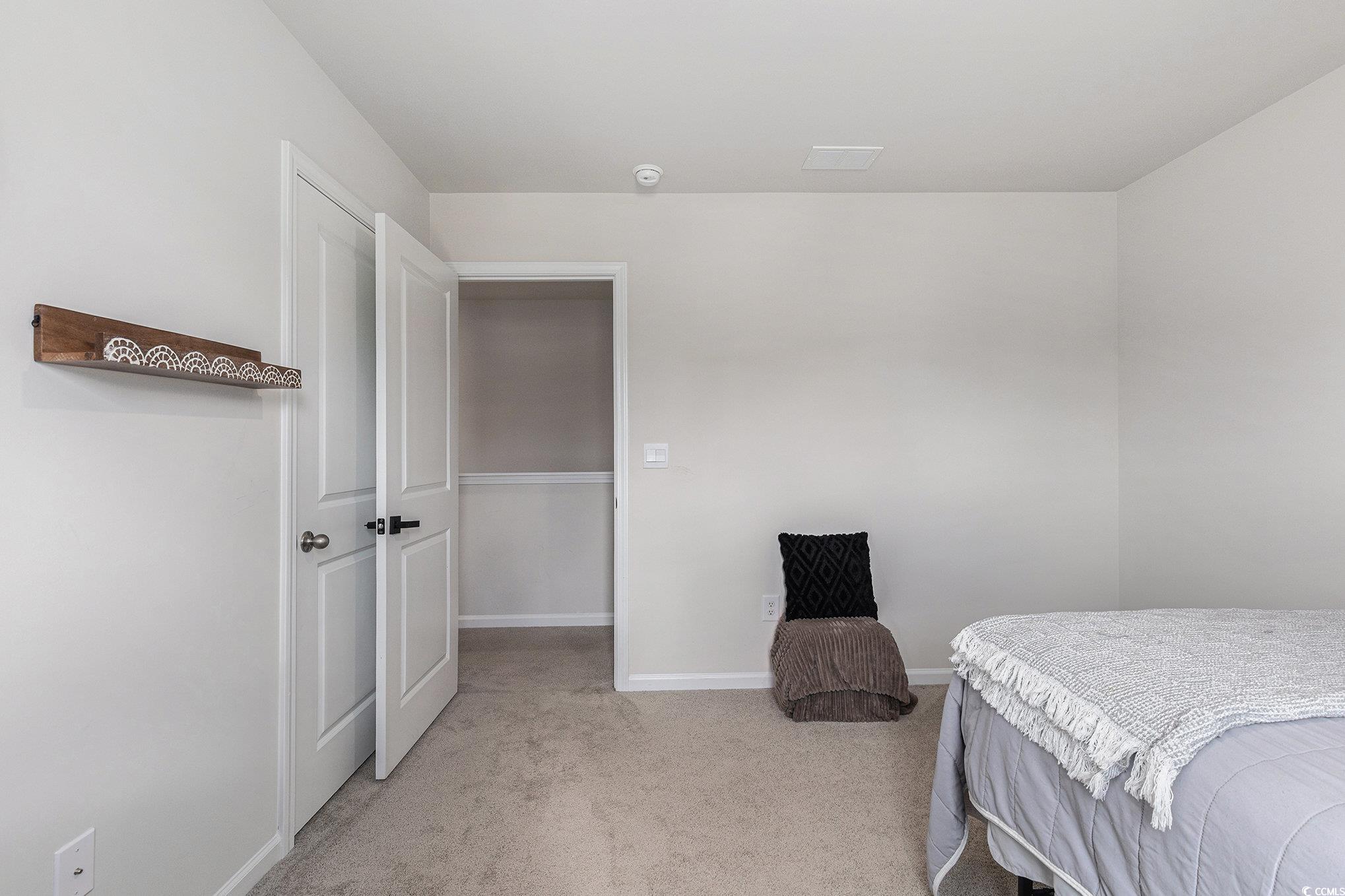 651 Choctaw Drive Conway, SC 29526 - Photo 20 of 37 Bedroom with light carpet and baseboards
