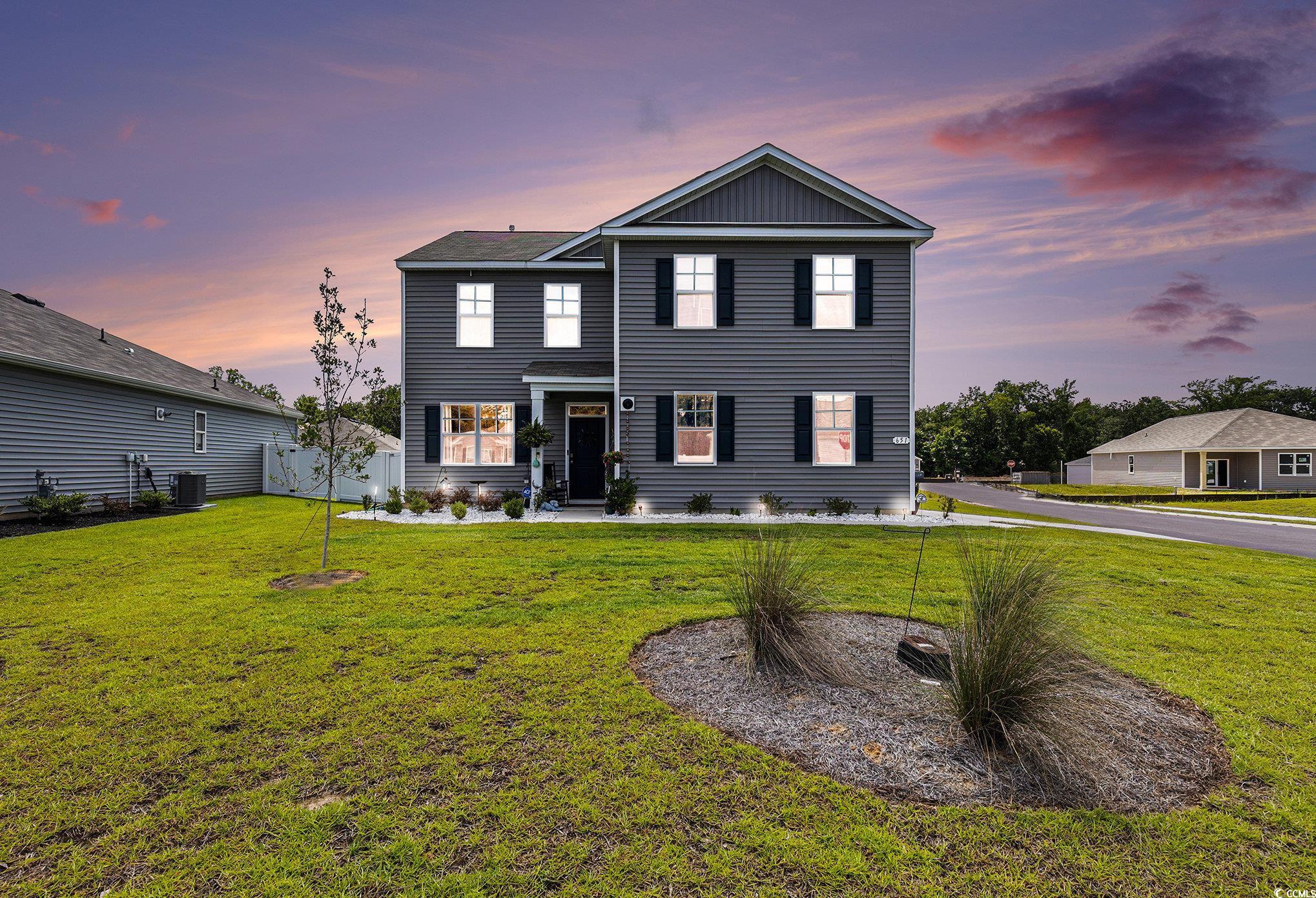 651 Choctaw Drive Conway, SC 29526 - Photo 2 of 37 Traditional-style home featuring a lawn