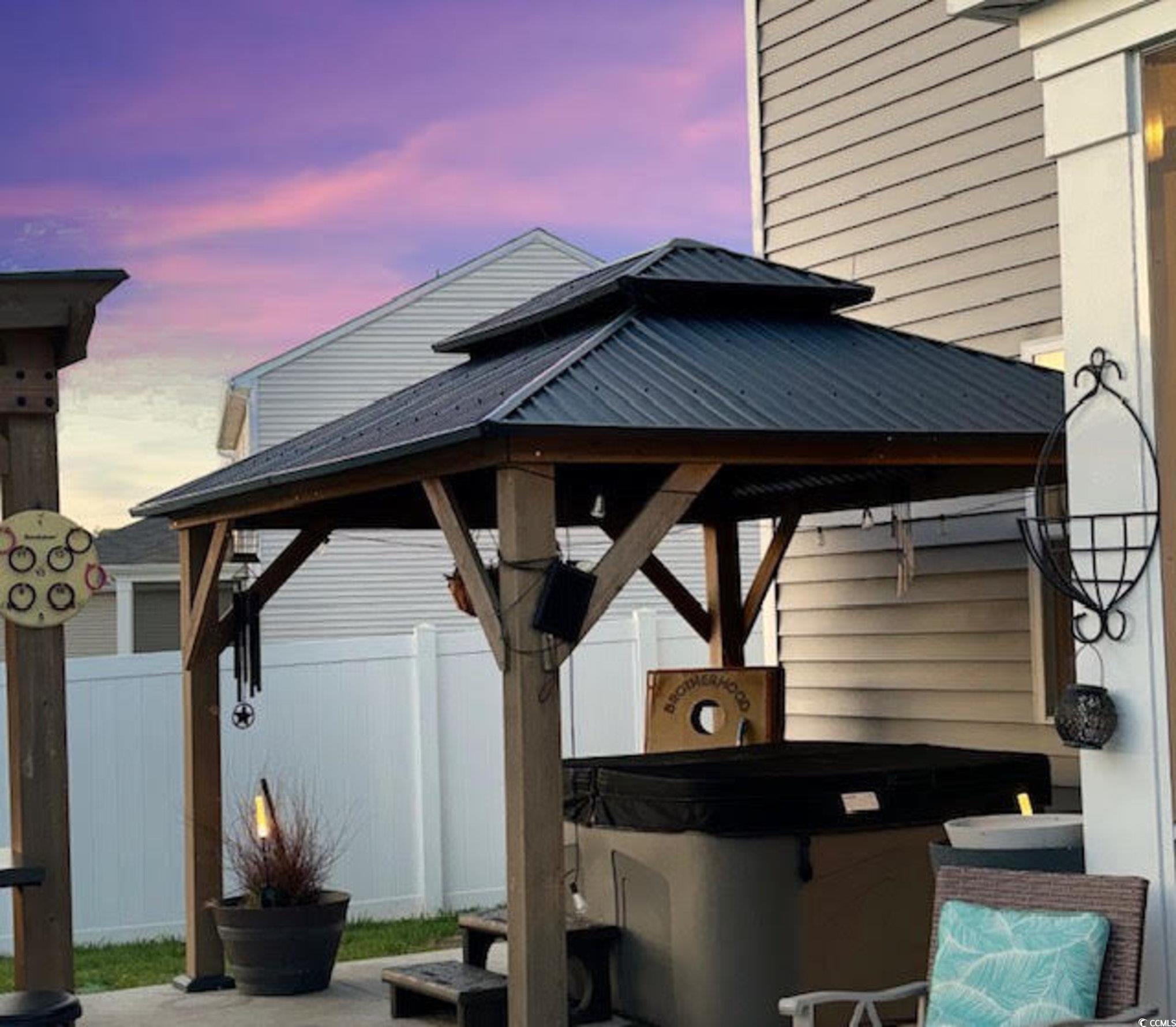 651 Choctaw Drive Conway, SC 29526 - Photo 28 of 37 View of patio / terrace with a gazebo and a hot tub