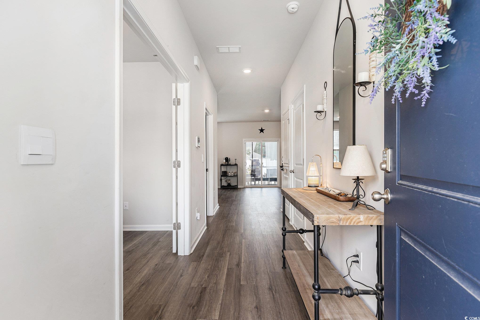 651 Choctaw Drive Conway, SC 29526 - Photo 3 of 37 Corridor with dark wood finished floors and recessed lighting