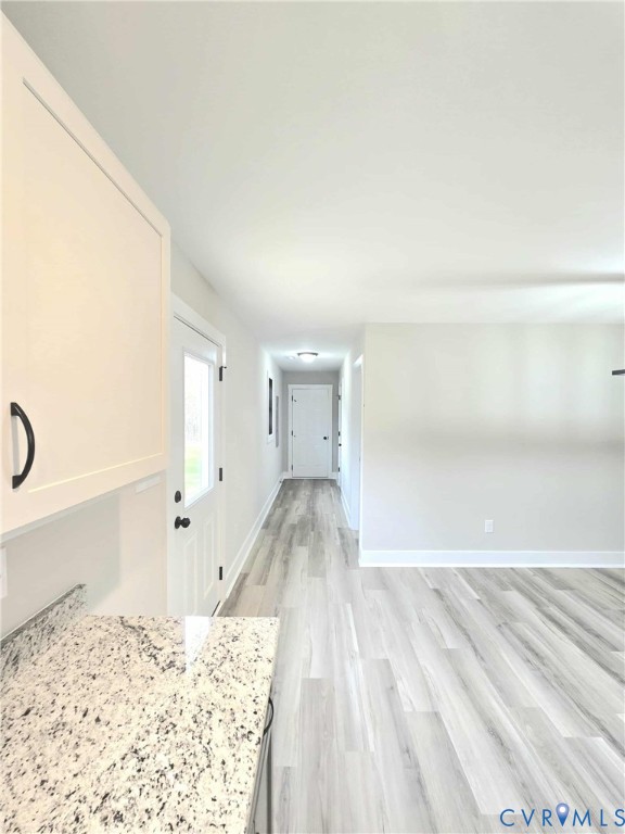 1775 Bumpass Road Bumpass, VA 23024 - Photo 10 of 42 a view of a kitchen with wooden floor and a sink