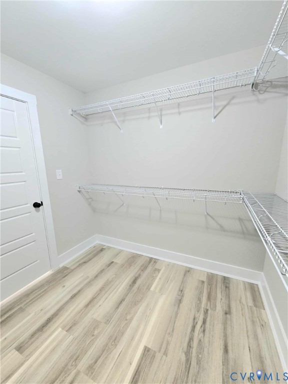 1775 Bumpass Road Bumpass, VA 23024 - Photo 16 of 42 a view of a room with racks on the wall