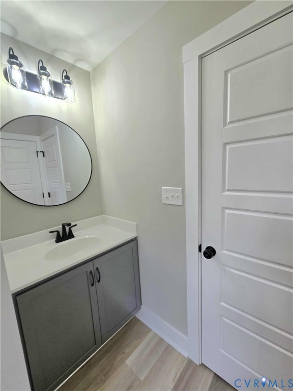 1775 Bumpass Road Bumpass, VA 23024 - Photo 23 of 42 a bathroom with a sink and a mirror