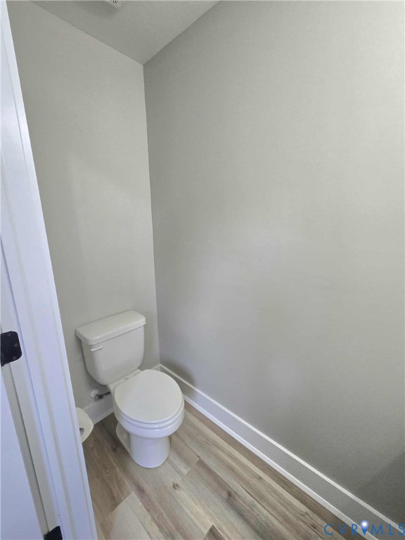 1775 Bumpass Road Bumpass, VA 23024 - Photo 32 of 42 a white toilet sitting next to a shower