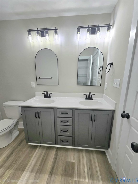 1775 Bumpass Road Bumpass, VA 23024 - Photo 33 of 42 a bathroom with a double vanity sink and a mirror