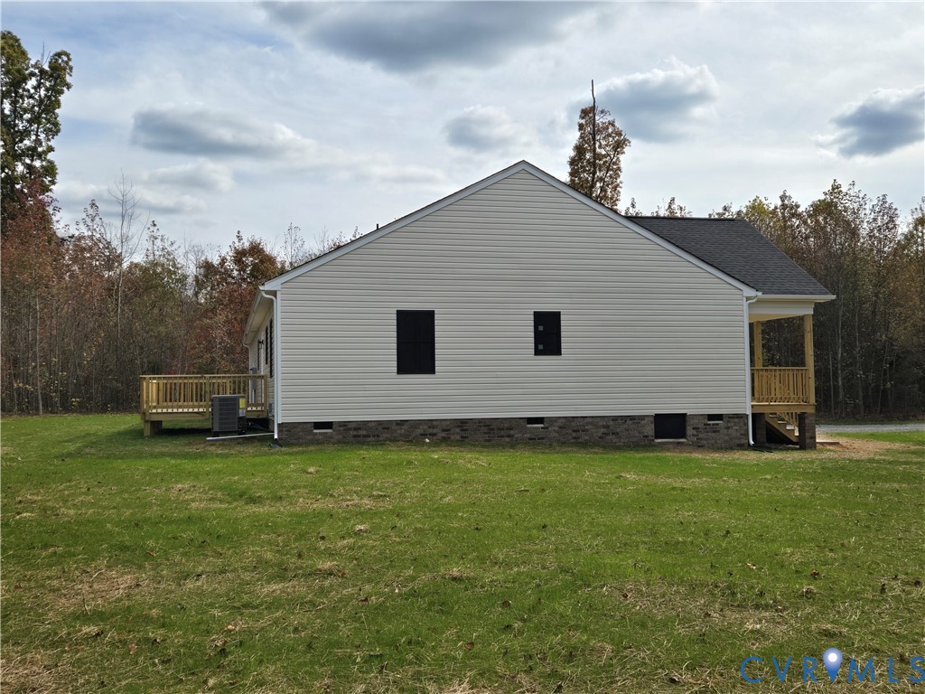 1775 Bumpass Road Bumpass, VA 23024 - Photo 6 of 42 a view of a backyard of the house