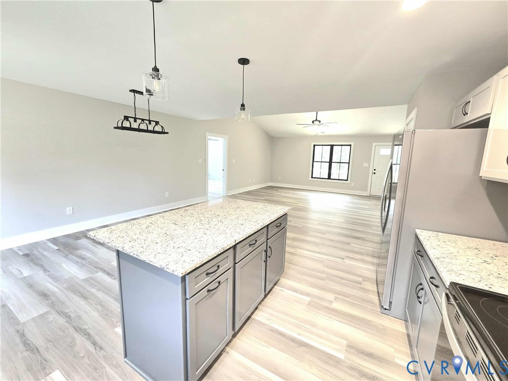 1775 Bumpass Road Bumpass, VA 23024 - Photo 42 of 42 a bathroom with a sink a vanity and a mirror