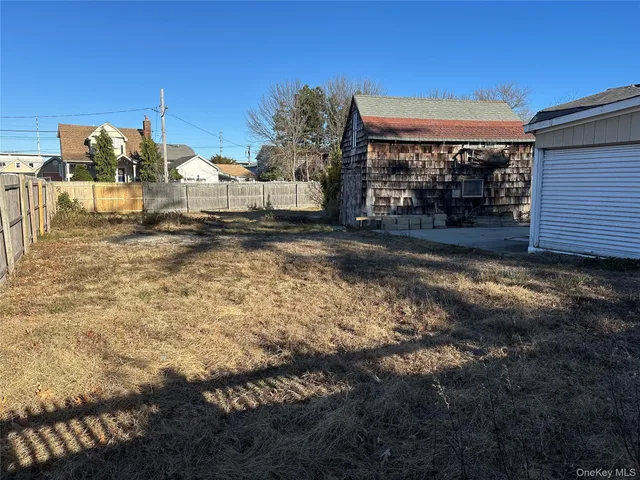 a view of a town with barn house